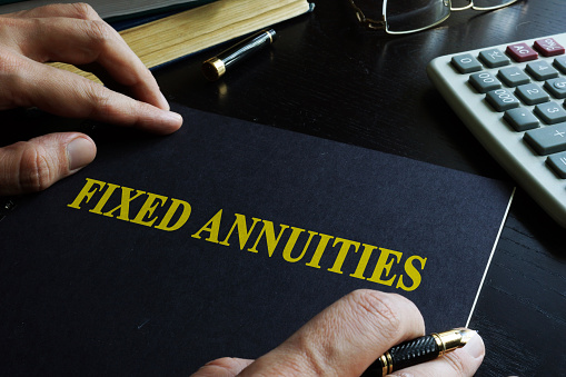 Fixed Annuities. Book on an office table.